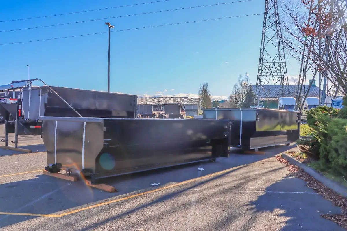 Roll-off dumpster ready for waste disposal at job site for Concrete Dumpster Rental in Ellsworth